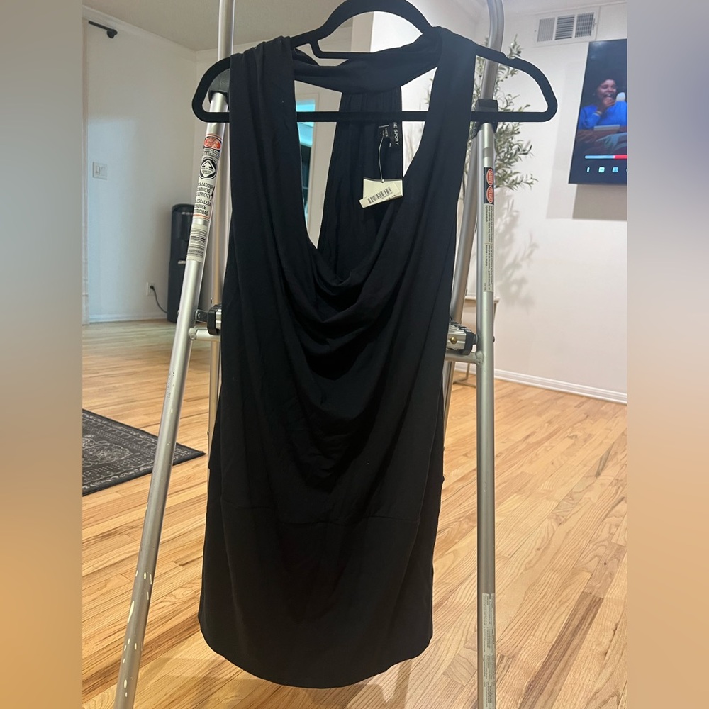 Women Bebe sport black shirt, brand new with tag
